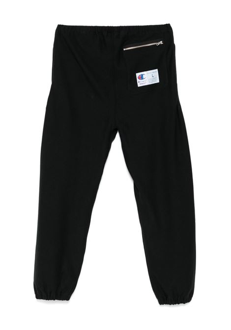 Black logo-detail track trousers Champion x undercover - men CHAMPION X UNDERCOVER | UC1E4511BLK